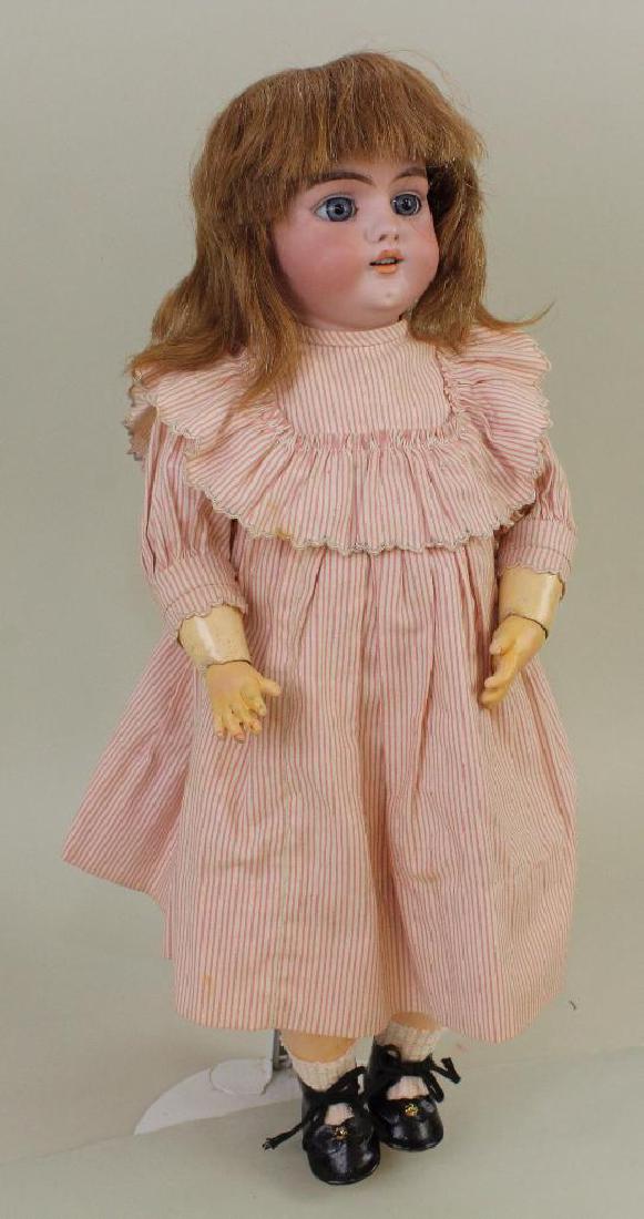 15" S & H 1079 DEP 6 1/2 GERMAN ANTIQUE BISQUE HEAD: Stationary blue eyes, open mouth, pierced ears, brown human hair wig. Papier mache ball jointed body. Dressed in antique cotton dress with Bertha collar, pantaloons. Newer petticoat. Black oilcloth sh