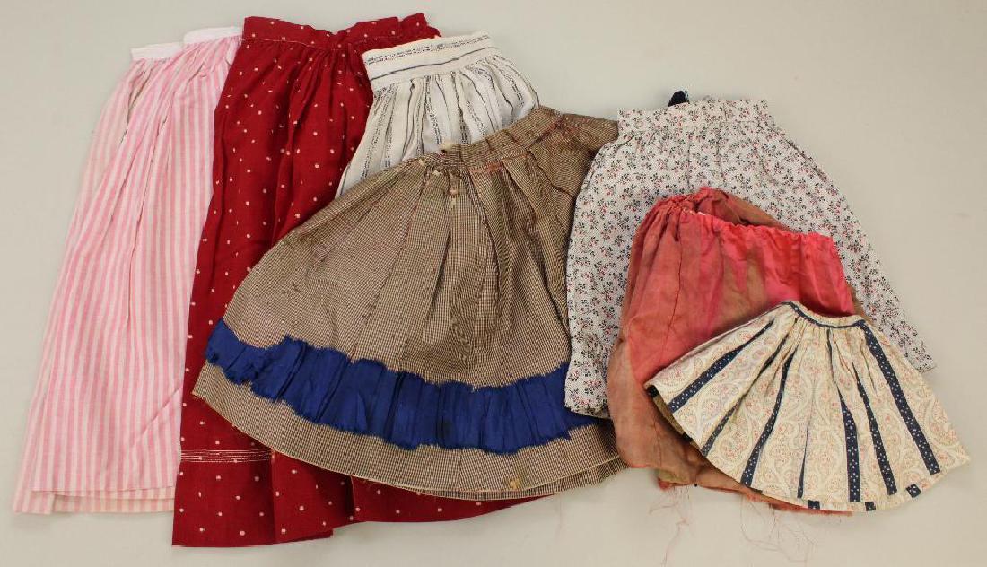 BODY PARTS & SUPPLIES: LOT OF ANTIQUE DOLL SKIRTS. (1 of 3)
