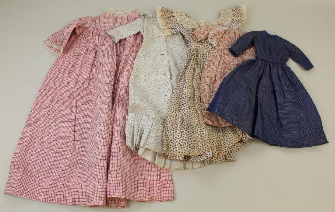 BODY PARTS & SUPPLIES: LOT OF ANTIQUE DOLL DRESSES. (1 of 3)