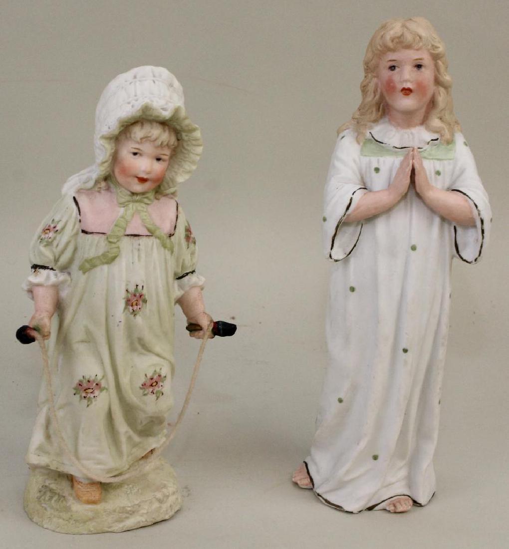 PAIR OF  FEMALE HEUBACH FIGURINES: CHILD PRAYING AND (1 of 2)