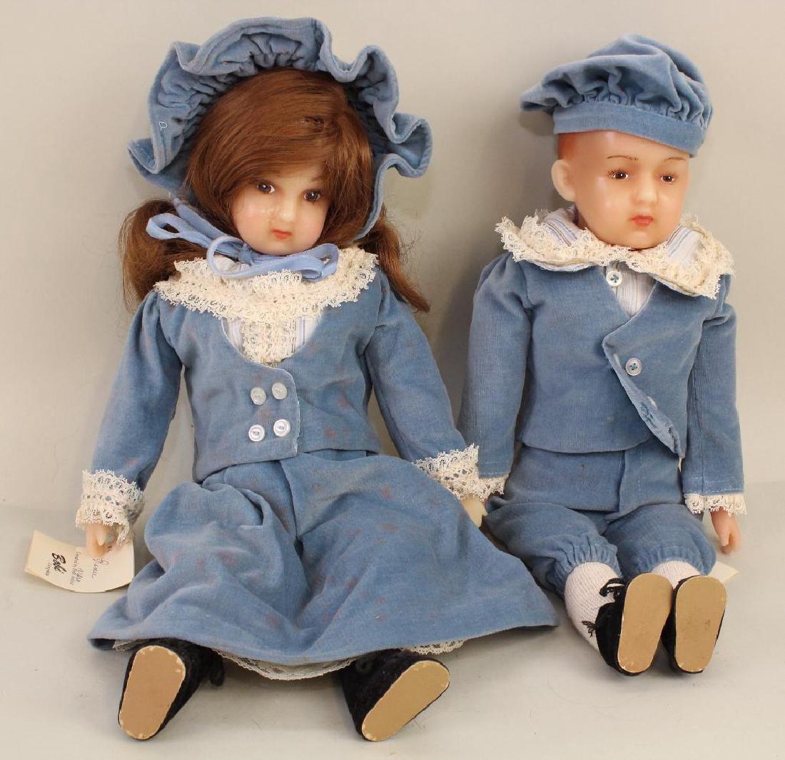 PAIR OF TAGGED 15" WAX DOLLS BY ARTIST BOBI LANGHAU.: Tags read: Created by Repro doll artist Bobi Langhau. Both dolls have painted eyes. Renee is wigged, Heubach boy has painted hair. Both have wax heads, shoulder plates, lower limbs."Renee" and "Heubac