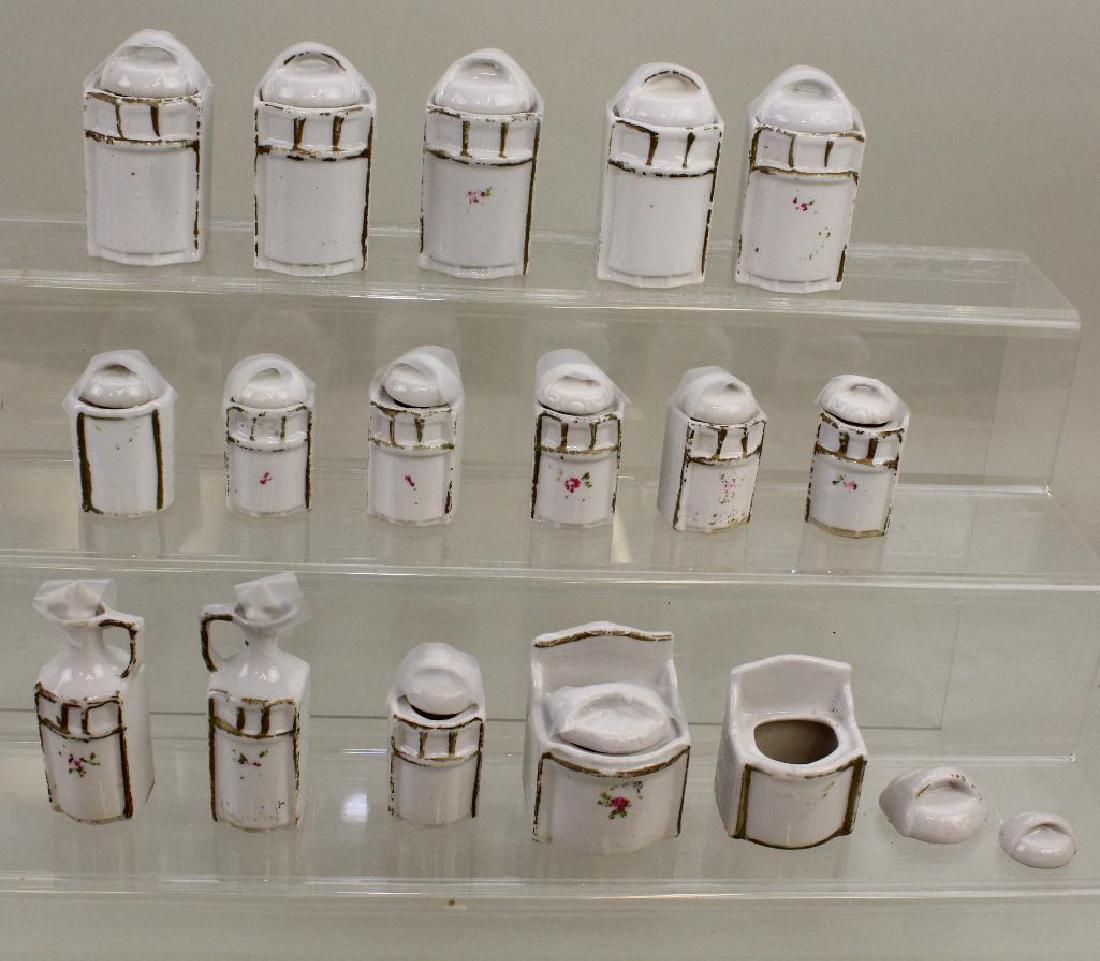DOLL SIZE ANTIQUE CHINA CANNISTER SET. (1 of 1)