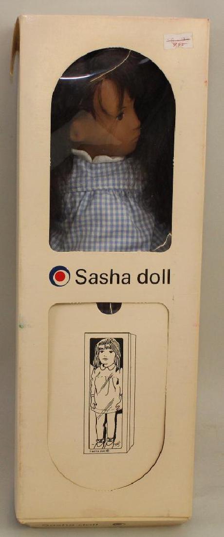 NRFB 16" "SASHA BRUNETTE GINGHAM" DOLL 4-103 D.366 USA.: Box end reads: Sasha serie. Made in England. Emported exclusively into USA by Creative Playthings, Princeton, NJ. $18.95. (Box lid insert with doll.) Condition: this doll would be MIB except that ther