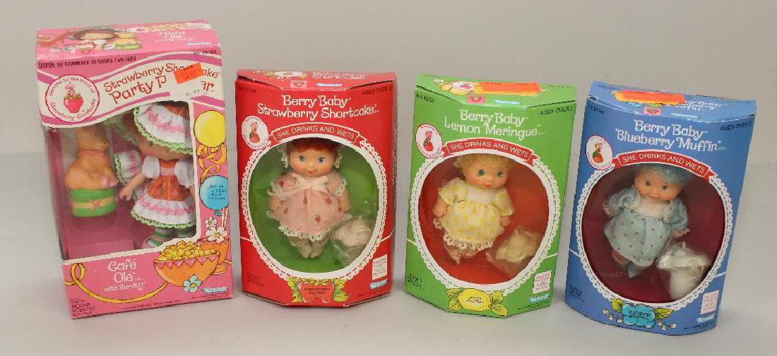 LOT OF (4) MIB STRAWBERRY SHORTCAKE FAMILY DOLLS.: Strawberry Shortcake Party Pleaser Cafe Ole with Burrito. Berry Baby Blueberry Muffin. Berry Baby Lemon Meringue. Berry Baby Strawberry Shortcake.
