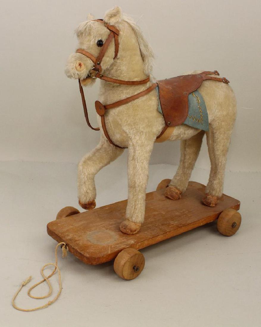 18" T x 17" L  UNMARKED WHITE MOHAIR HORSE PULL TOY. (1 of 3)