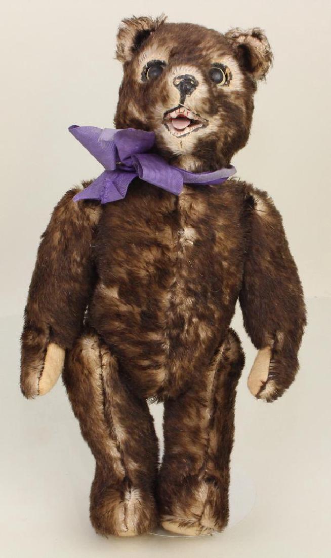 14" UNMARKED ANTIQUE BROWN TIPPED MOHAIR CHARACTER BEAR: Fully jointed, swivel head, inset eyes. Open mouth showing papier mache teeth and tongue. Felt pads. Excelsior stuffed. Condition: nothing observed.