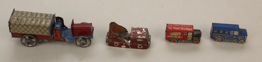 LOT OF (4) TIN VEHICLES INC. PENNY; CRACKER JACK. (1 of 3)