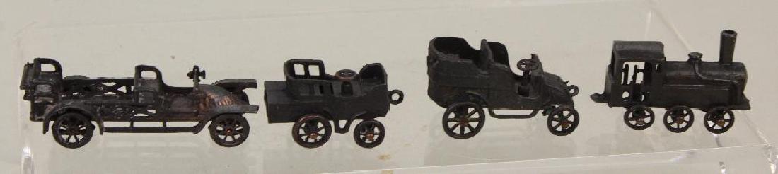 LOT OF (4) FRENCH METAL TOYS.: (2) Are marked DePOSE - automobile (damage) and whistle toy car (also marked S.R.) Additional car marked FRANCE. Train engine marked NORD 1150.