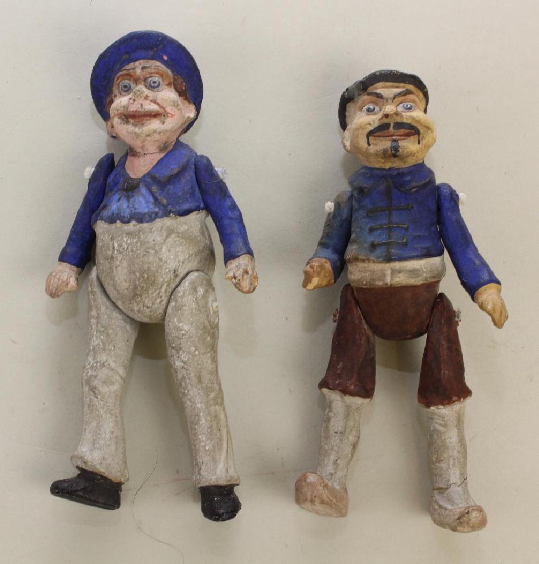 PAIR OF 5" PAPIER MACHE JOINTED "BROWNIES".: Condition: some age loss.
