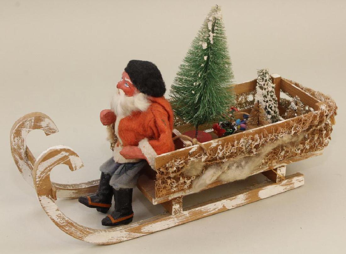 ANTIQUE PAPIER MACHE SANTA CLAUS FIGURE IN SLEIGH. (1 of 4)