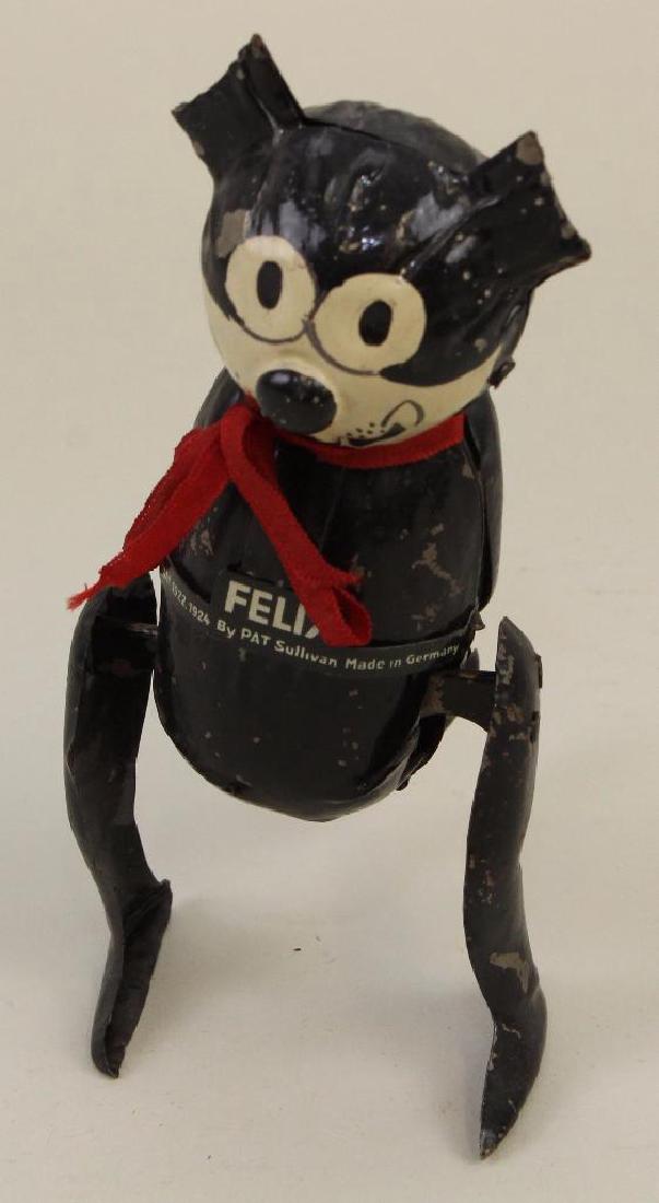 7""FELIX-THE-CAT" WALKER TIN WINDUP TOY.: Marked: Copyright 1922, 1924 By Pat Sullivan Made in Germany. Condition: paint loss. Sluggiish.