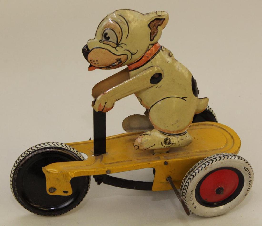 6" S.G. CORD "BONZO" TIN WINDUP TOY. (1 of 5)