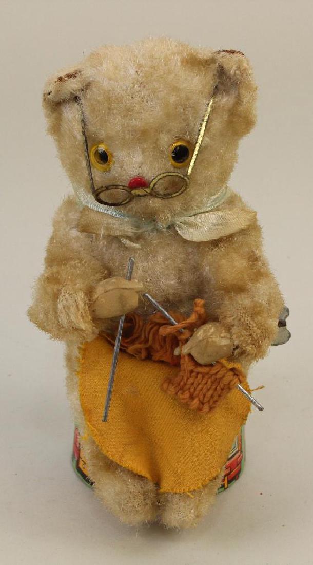 6" "SITTING BEAR KNITTING" TIN/CLOTH WINDUP TOY. (1 of 3)
