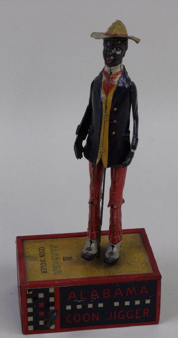 10 1/2" MARKE LEHMANN "ALABAMA COON 'JIGGER" TIN WINDU: "OH-MY", 685. Made in Germany Patented 12 Mai, 1903 - 27 Febr, 1912. Condition: in good working order. Paint scratches.