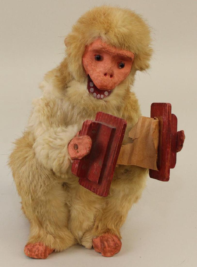 11" FRENCH RD FUR COVERED MECHANICAL MONKEY TOY. (1 of 6)