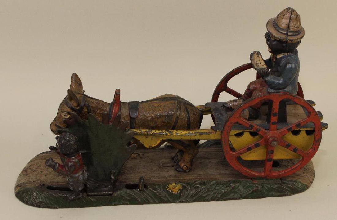 ANTIQUE CAST IRON BANK: "BAD ACCIDENT". (1 of 6)