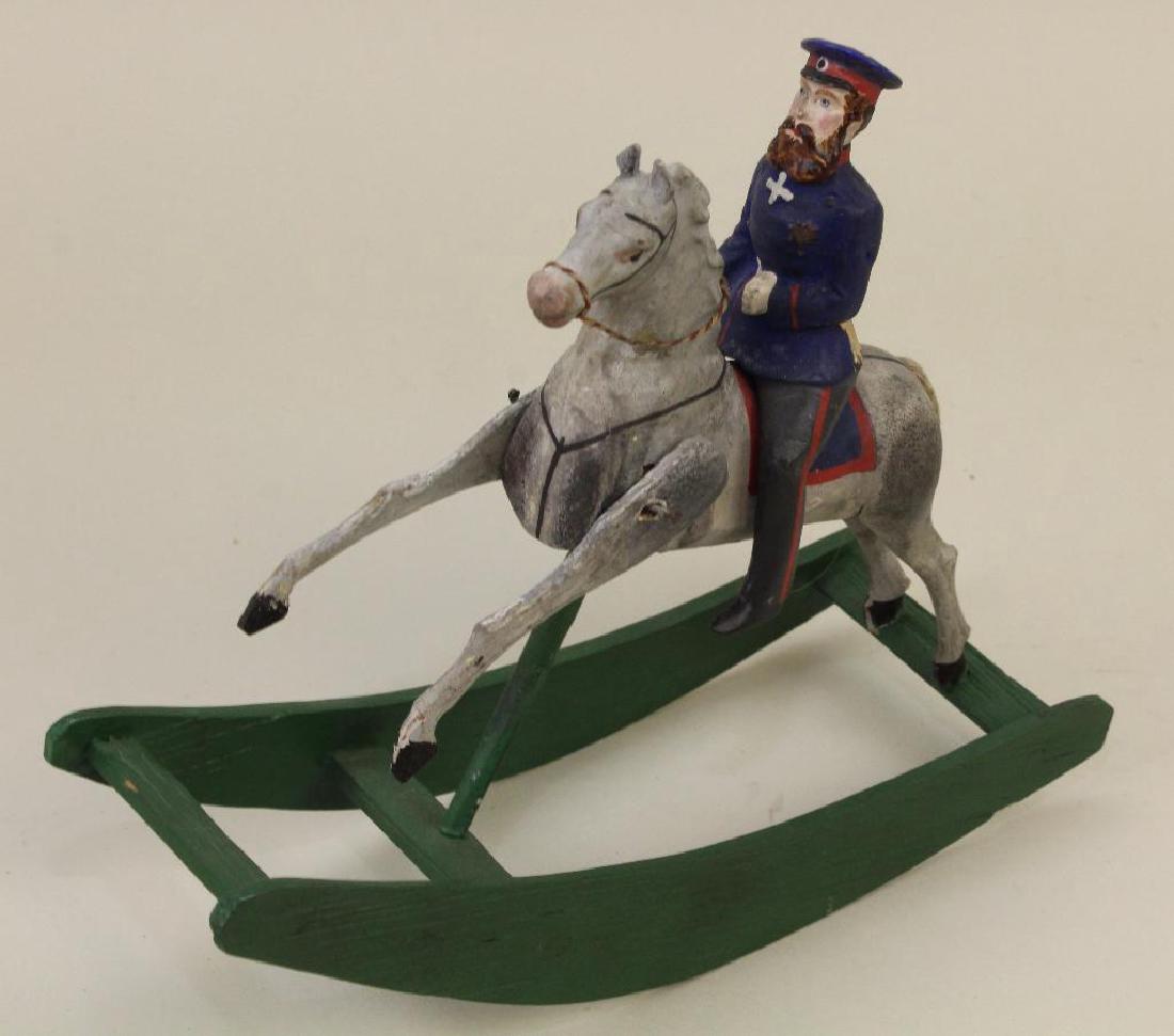 7" T x 8" L PAPIER MACHE/WOOD SOLDIER ON ROCKING HORSE. (1 of 4)