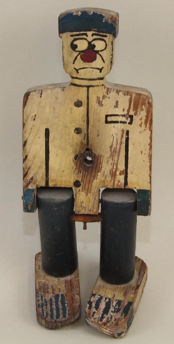 TOY PARTS: 8 1/2" WOODEN BARRY TOY & MFG CO WALKING PUL: Ca. 1920's, Patented, Philadelphia, PA. This is the same style as a Mecky Co. "Sambo" figure. This toy is missing the metal bracket and wooden wagon he pulled. Condition: this lot is being sold AS IS.