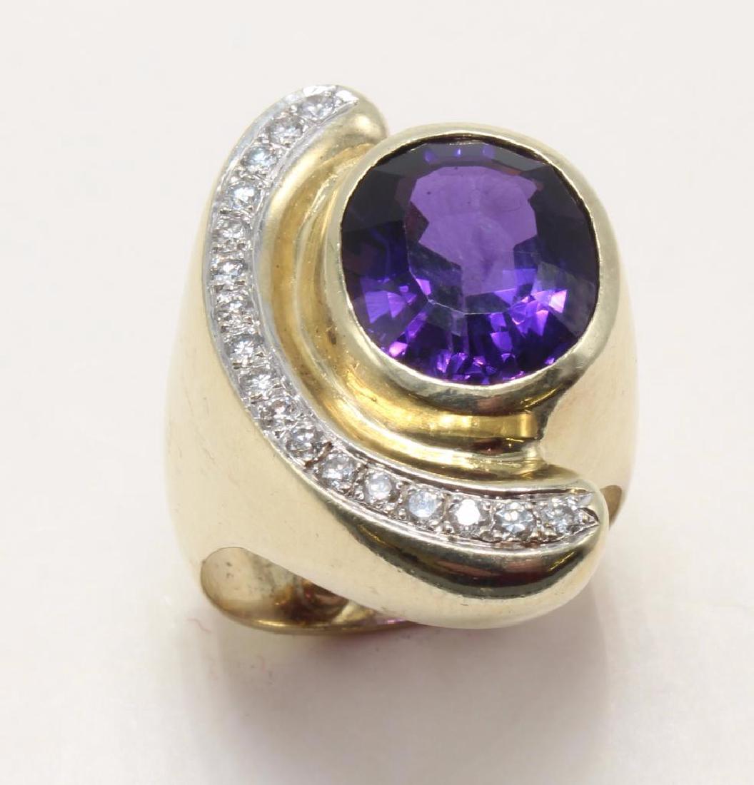 14K Yellow Gold Ring with Amethyst and Diamond: Features (1) 14 X 12mm oval Amethyst and (17) round Diamonds, approx. .50ctw. Size 9+ with arthritic balls. 19.2gtw.