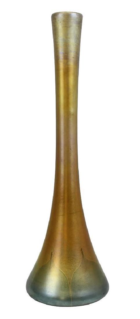 19" L.C. Tiffany Fauvile Vase: Tiffany Studios Iridescent Favrile, gold with blue pulled feather design at base of vase.