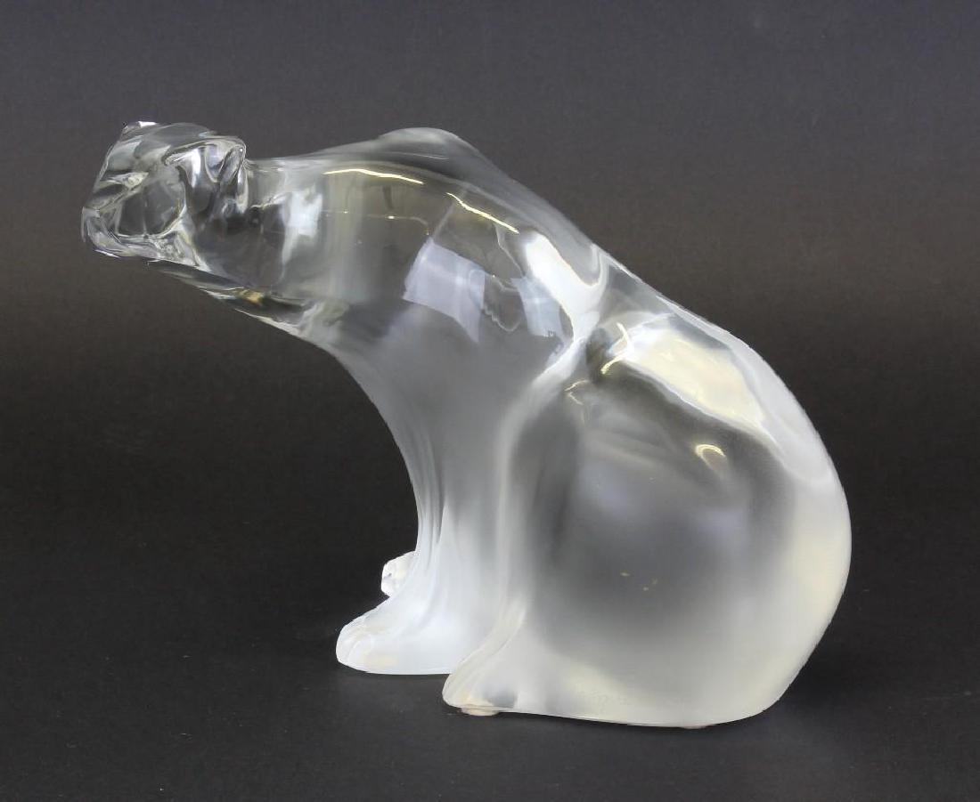 LaLique Crystal Polar Bear Figurine: Polished and frosted crystal, seated polar bear. Signed "LaLique" on lower right. 6.25"h x 7"w x 6.5"d