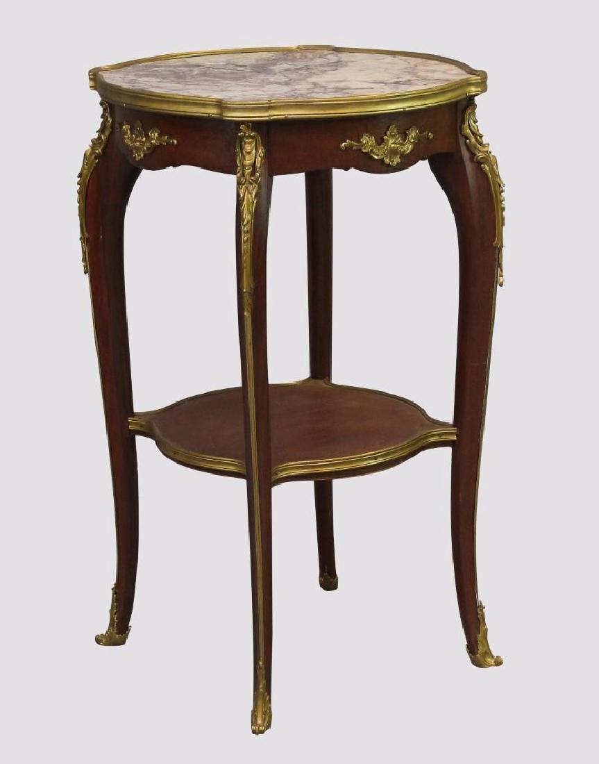 French Ormolu Mounted Parlor Table: Marble top, mahogany, two tier on cabriole legs, 30"h x19"w.