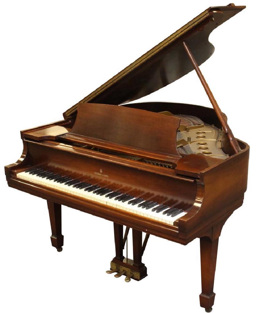 Steinway Baby Grand Piano: Serial No. 284998, mahogany case with tapered squared legs on casters, 38.5"h x 56"w x 61"d.