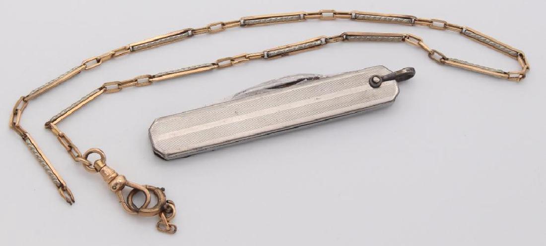 POCKET KNIFE WITH CHAIN. STERLING, GOLD FILLED: BAIL ON KNIFE IS MARKED STERLING. 13" LONG YELLOW AND WHITE GOLD TONE CHAIN, BROKEN, IS MARKED GOLD FILLED. 
