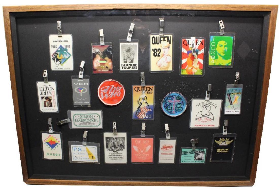 Framed Grouping of Backstage Passes: Artists to include, Hall and Oats, Blondie, Yes, Fleetwood Mac, Queen, Billy Joel, Elton John, and more with Black Sabbath and The Who complimentary badges, 34"h x 25"w.