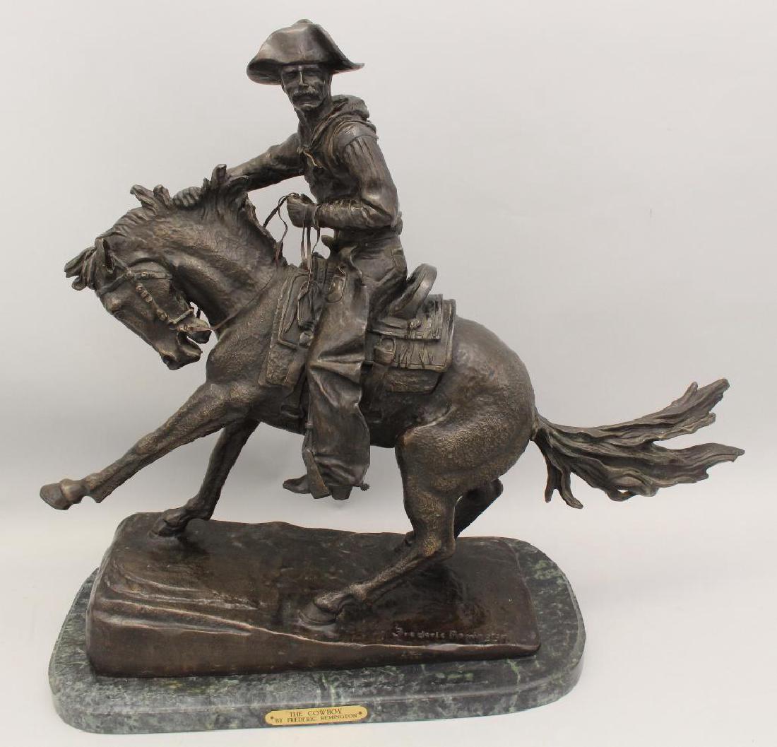 Attributed to Frederic Remington, "The Cowboy" Bronze: Marble base, signed, "Frederic Remington" on base 104/250, 23"h x 19"w x 10"d.