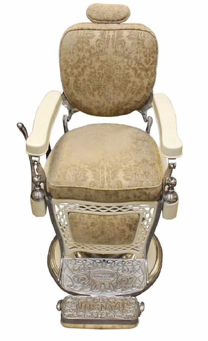 Hanson Barber Chair: Patented by Emil J. Paidar Co. Chicago, Ill, with an encased set of barber tools and a Nev-A-Hone razor strap, 48"h x 25"w x 36"d.