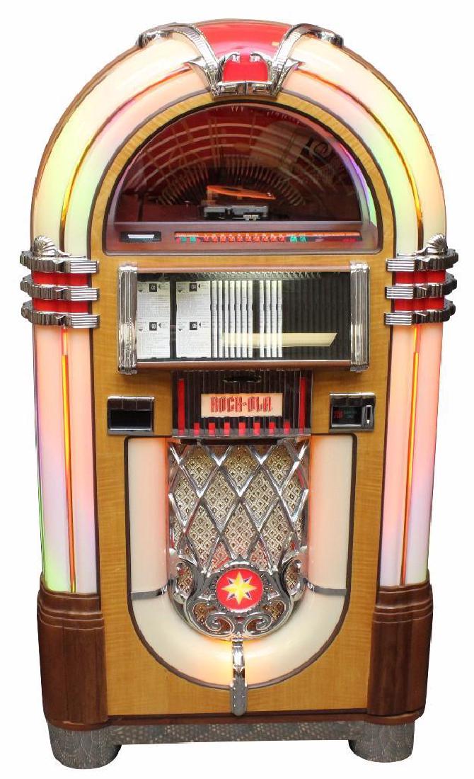 Rock-Ola CD-8 "Bubbler" Jukebox: Seral No. 754913840100, with complementing CDs, 61"h x 33"w x 23"d.