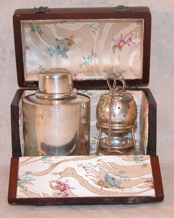 Sterling Silver Tea Caddy and Ball in Case.