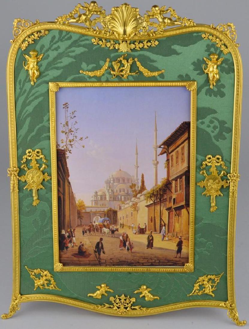 Neoclassical Moire Ormolu Frame: Figural ormolu decoration on a green background. 14"h x 11"w