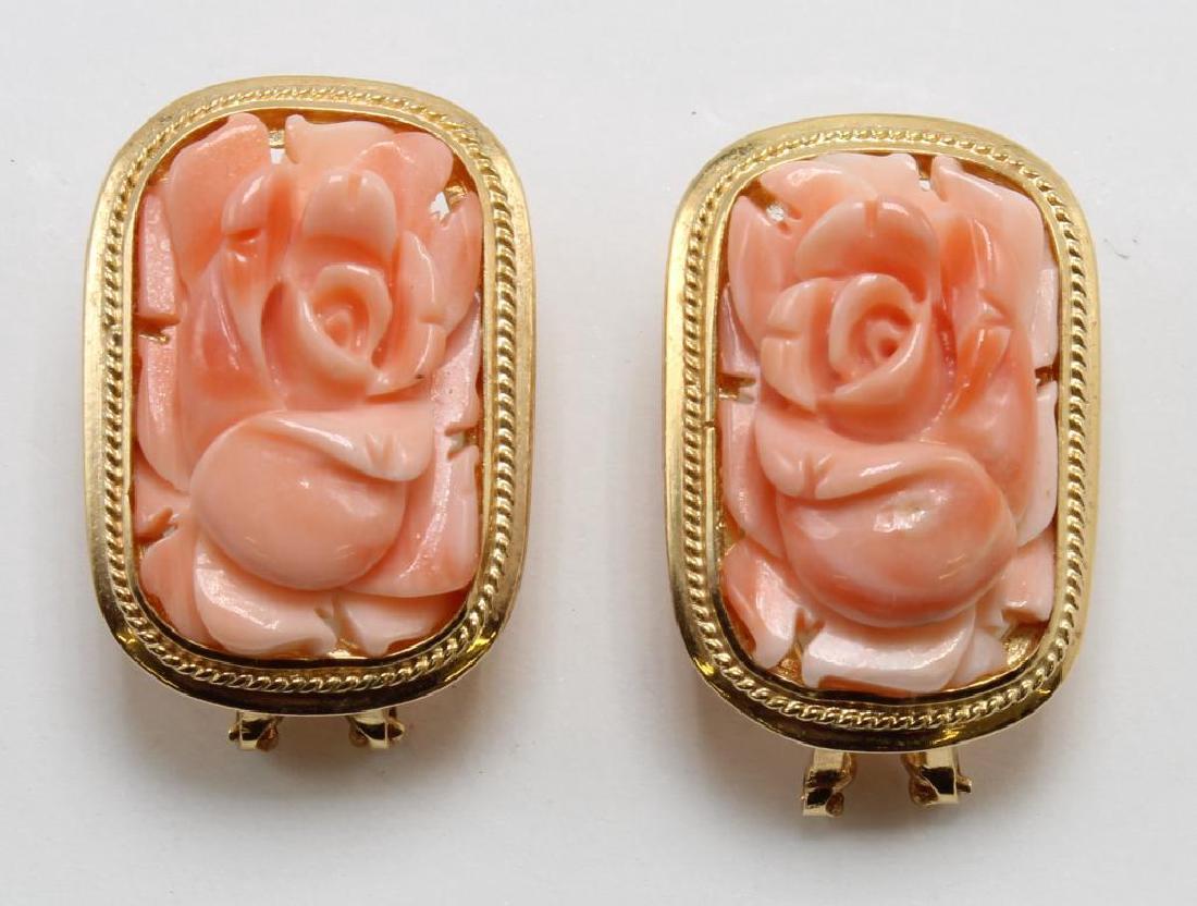 EARRINGS. CARVED CORAL. 14K YELLOW GOLD: OMEGA BACK POST. EACH EARRING FEATURES (1) 19 X 12MM RECTANGULAR BEZEL SET CARVED ROSE PLAQUE. 7.3GTW.