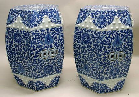 Pair Chinese Porcelain Blue and White Garden Seat: Hexagonal form finely decorated with scrolled lotus designs. 19 ½"h x 14"w.