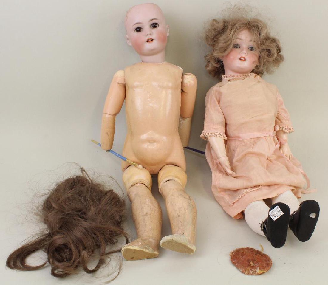 BODY PARTS - PAIR OF ANTIQUE BISQUE HEAD DOLLS. (1 of 3)