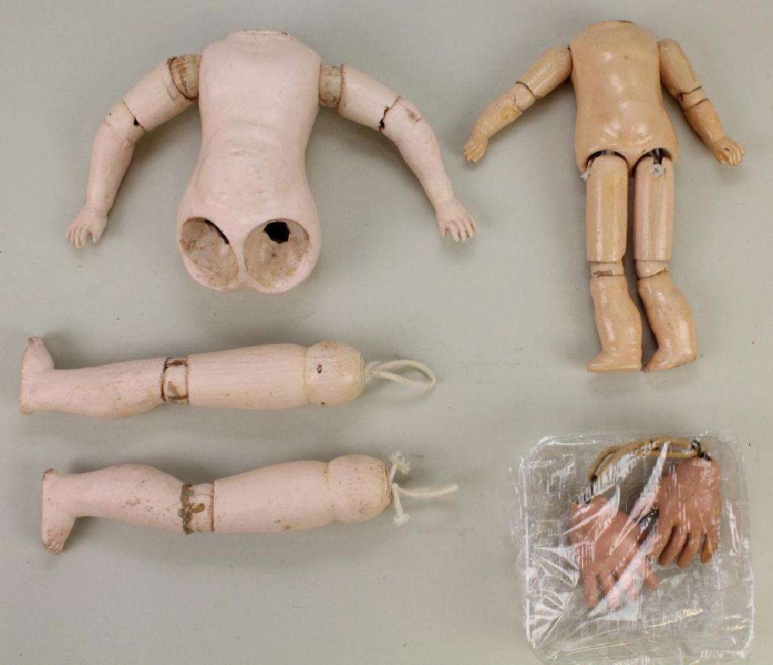 BODY PARTS - PAIR OF PAPIER MACHE BODIES, PAIR OF: Bodies - 8" has a jointed body without separate balls. 12 1/2" Body is jointed with separate shoulder balls only. Pair of 2 1/2" papier mache hands (repainted). Condition: this lot is being sold AS IS