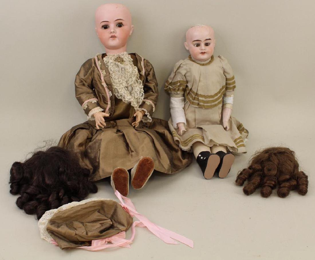 BODY PARTS - PAIR OF ANTIQUE BISQUE HEAD DOLLS. (1 of 3)