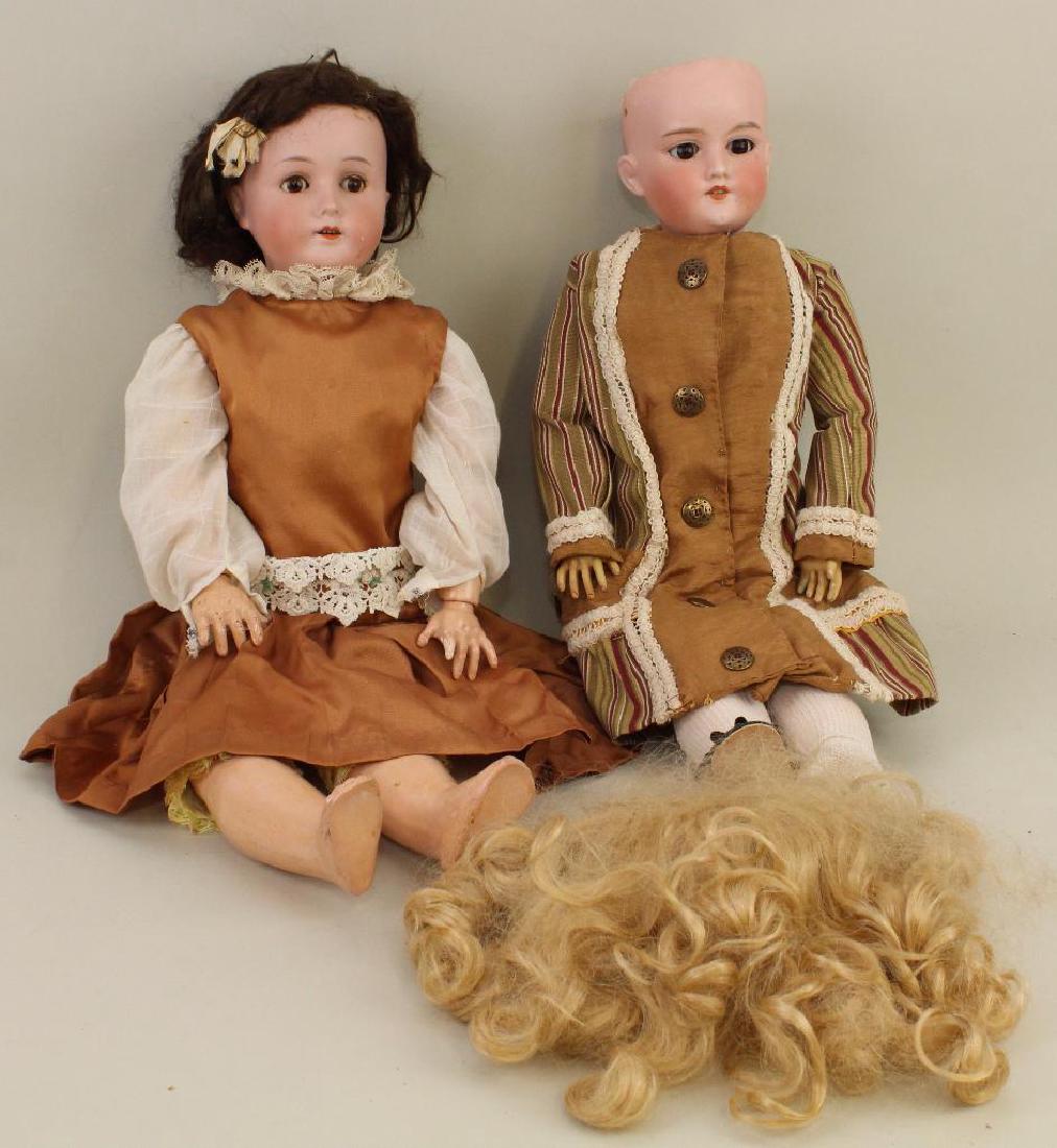 BODY PARTS - PAIR OF ANTIQUE BISQUE HEAD DOLLS. (1 of 3)