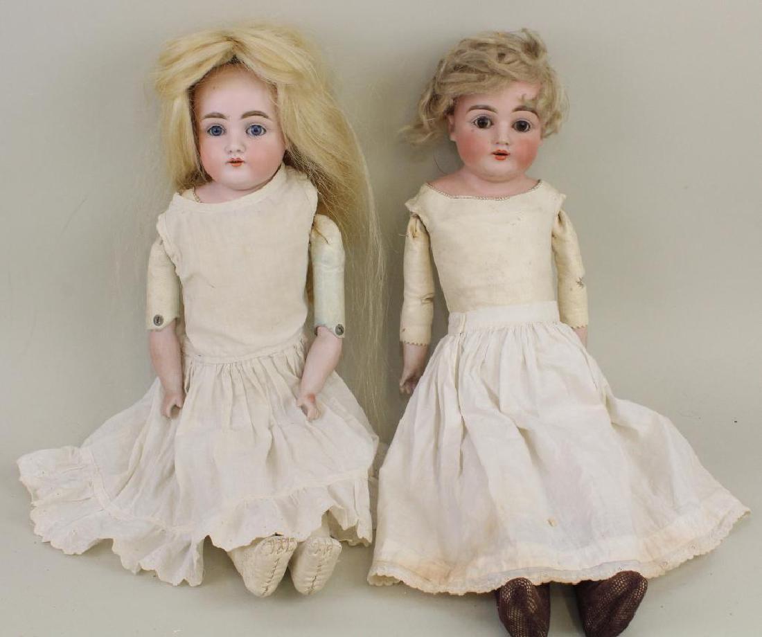 PAIR OF ANTIQUE BISQUE SHOULDER HEAD DOLLS. (1 of 5)