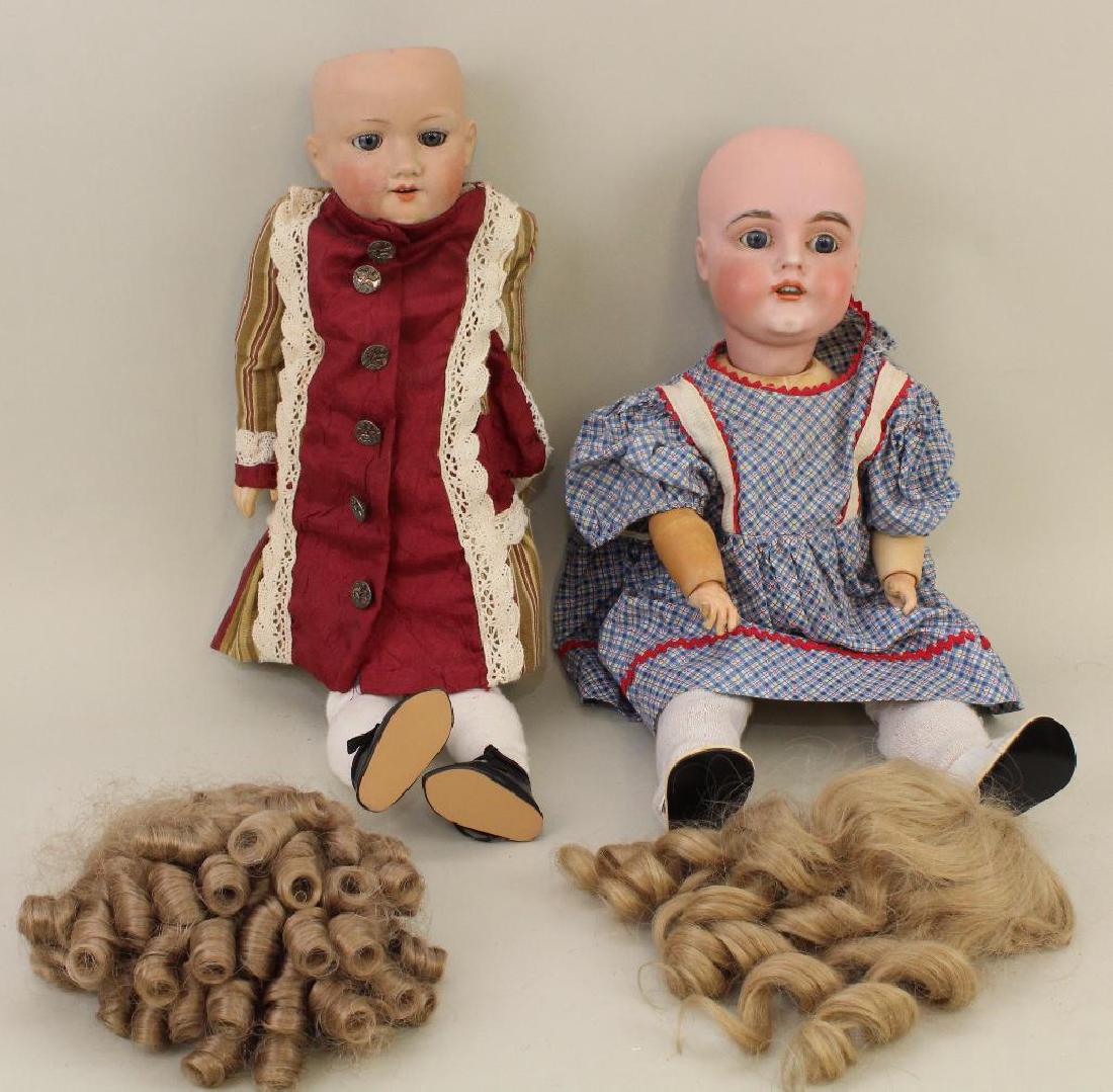 BODY PARTS - PAIR OF ANTIQUE BISQUE HEAD DOLLS. (1 of 3)