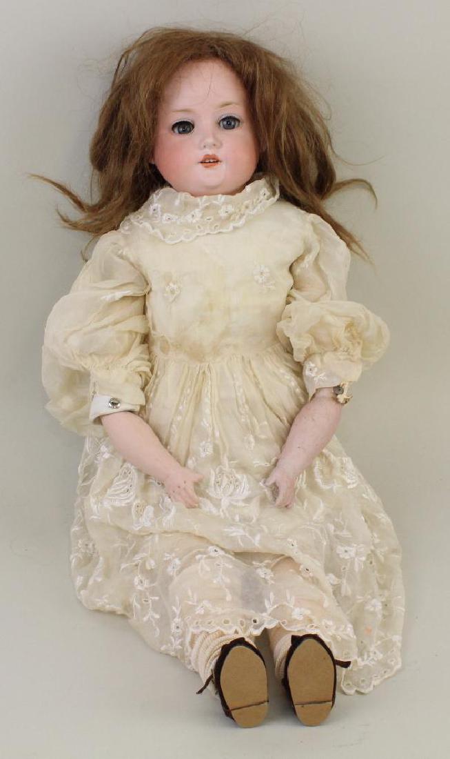 BODY PARTS - 25" ARMAND MARSEILLE GERMANY 370 A.8 M.: Blue sleep eyes, open mouth, brown human hair wig. Pin jointed leather body reads: Genuine Kid PERFECTION Germany with bisque lower arms, papier mache lower legs. Dressed in vintage clothing. Conditio