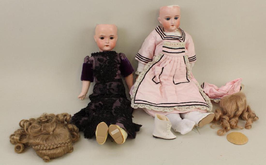 BODY PARTS - PAIR OF ANTIQUE BISQUE HEAD DOLLS. (1 of 3)