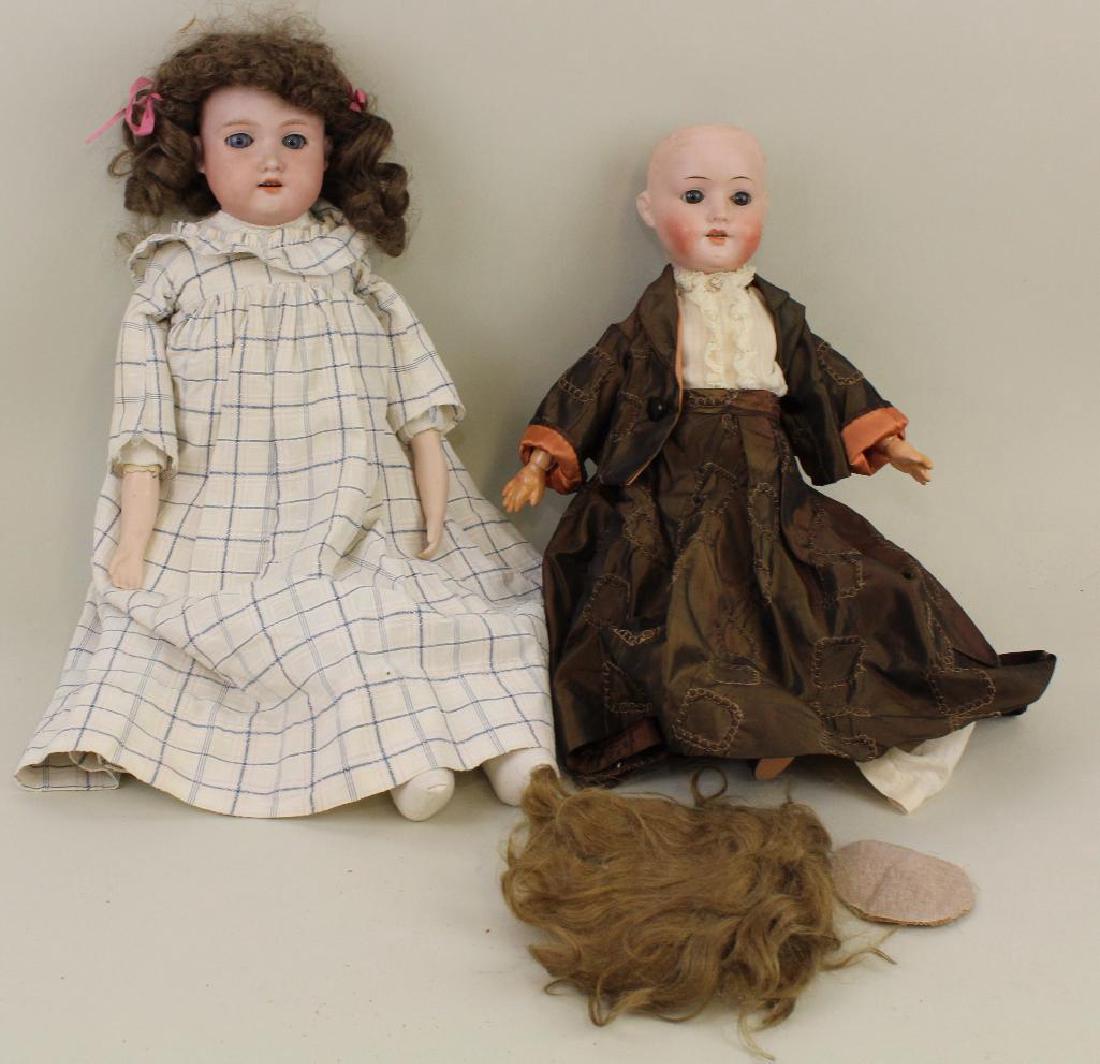 PAIR OF ANTIQUE BISQUE HEAD DOLLS. (1 of 3)