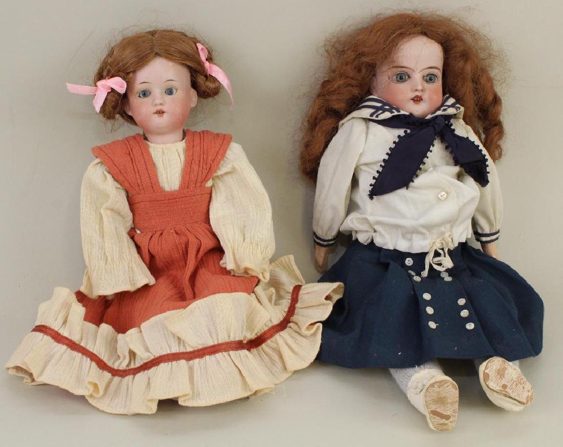 BODY PARTS - PAIR OF ANTIQUE BISQUE HEAD DOLLS. (1 of 3)