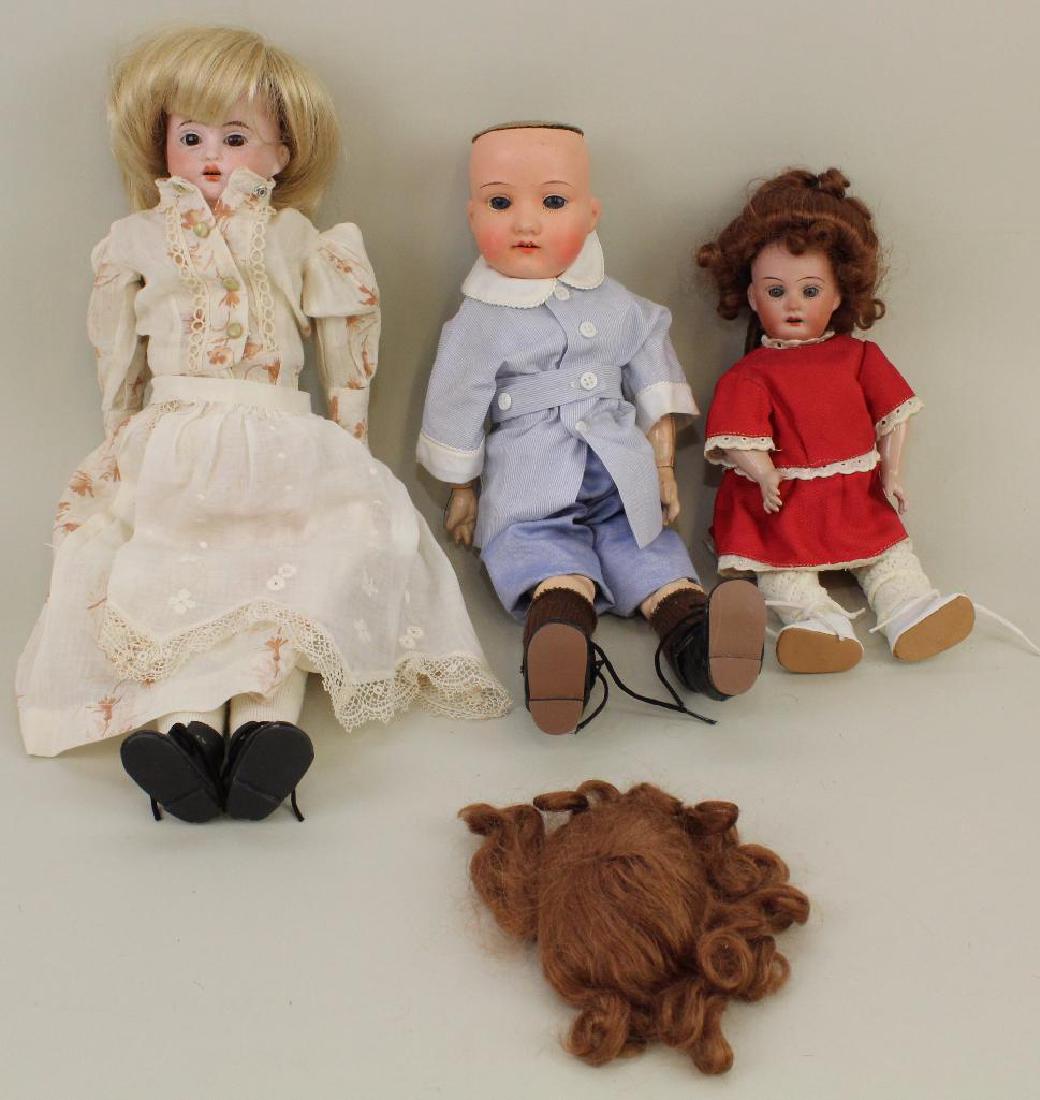 LOT OF (3) ANTIQUE BISQUE HEAD DOLLS. (1 of 4)