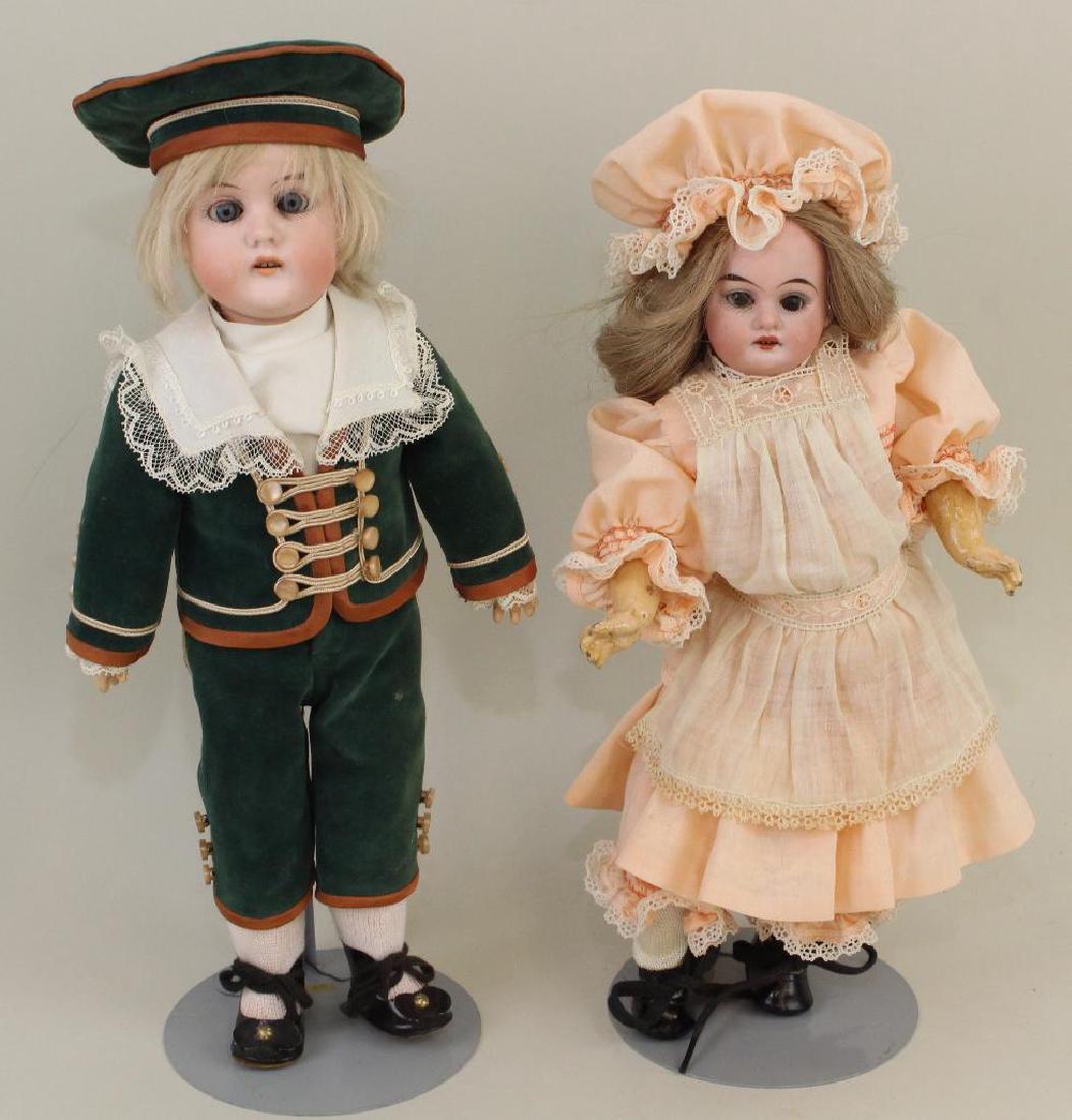 PAIR OF ANTIQUE BISQUE HEAD DOLLS. (1 of 3)