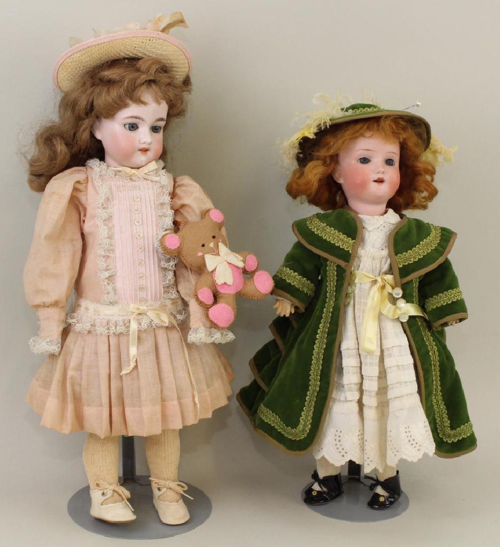 PAIR OF ANTIQUE BISQUE HEAD DOLLS. (1 of 3)
