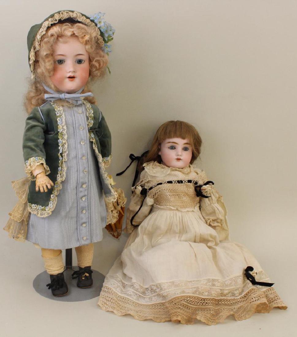 PAIR OF ANTIQUE BISQUE HEAD DOLLS. (1 of 3)